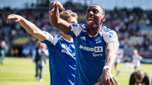 Sanders Ngabo celebrates with his teammates after Lyngby avoided relegation last season.
